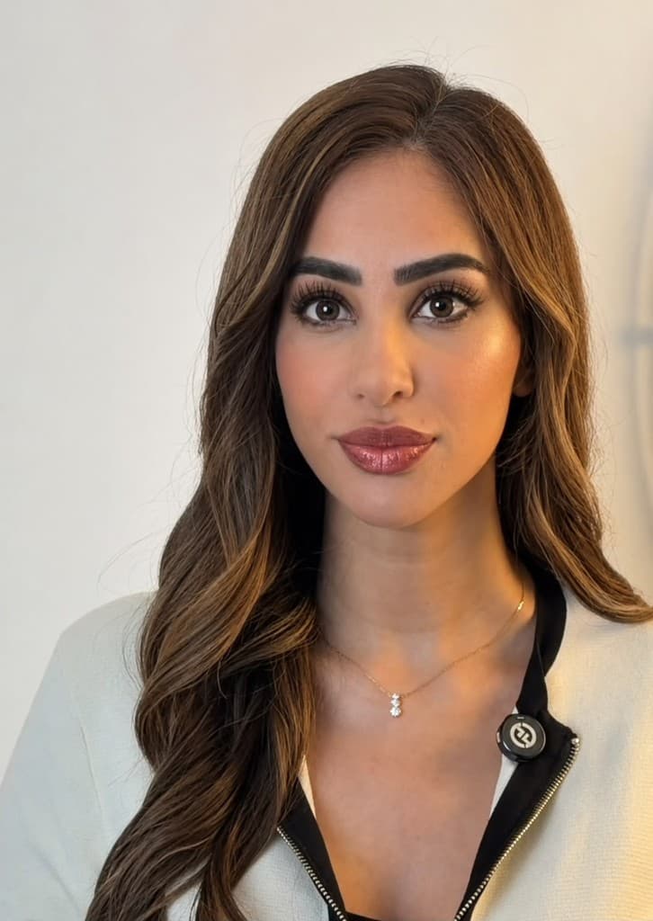 Professional headshot of Kiran Kaur, owner and clinical lead at Aesthetics by KK